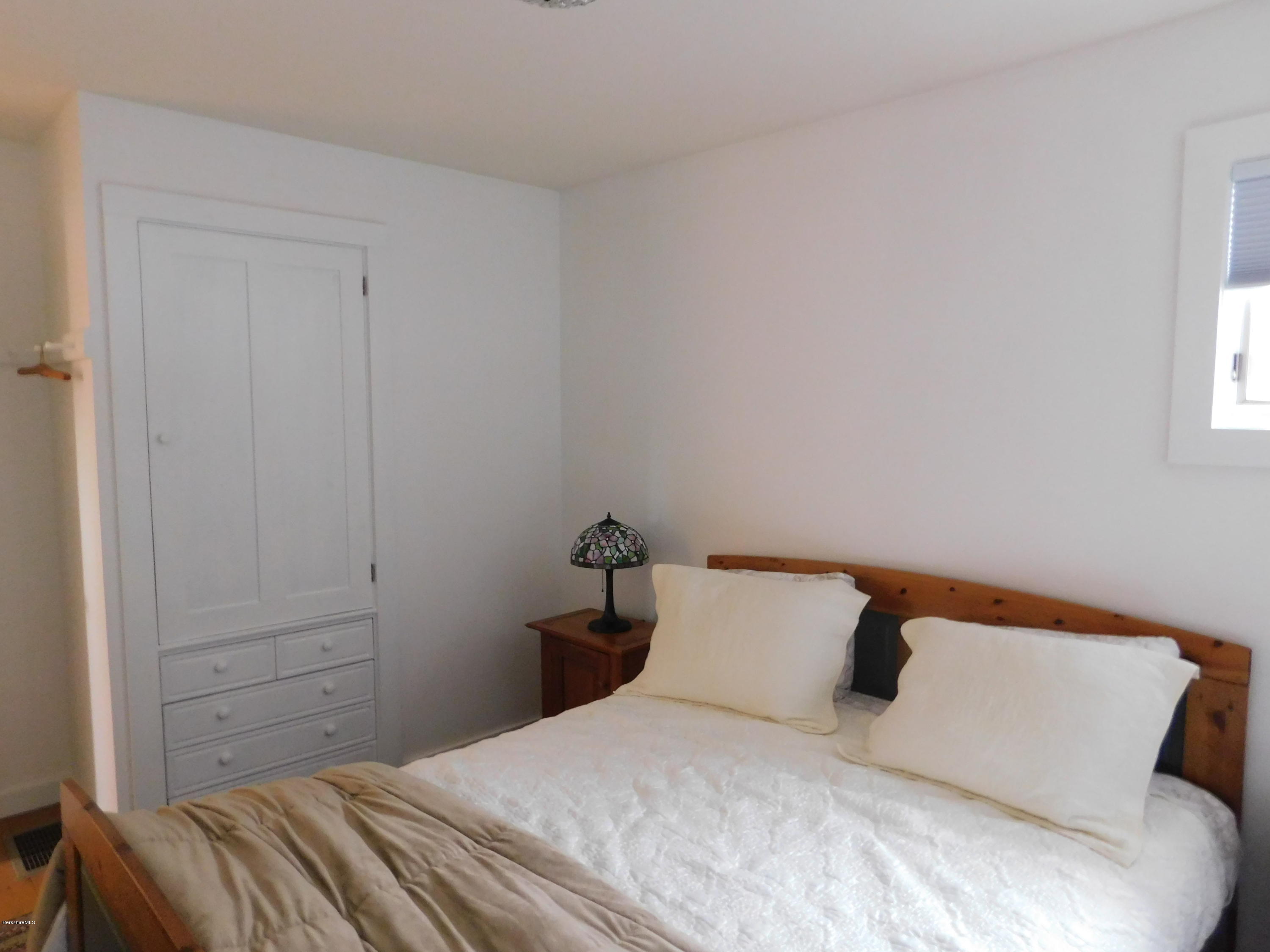 5 Jericho Road Hancock, MA 01267 - Photo 25 of 38 a bedroom with a bed and a window