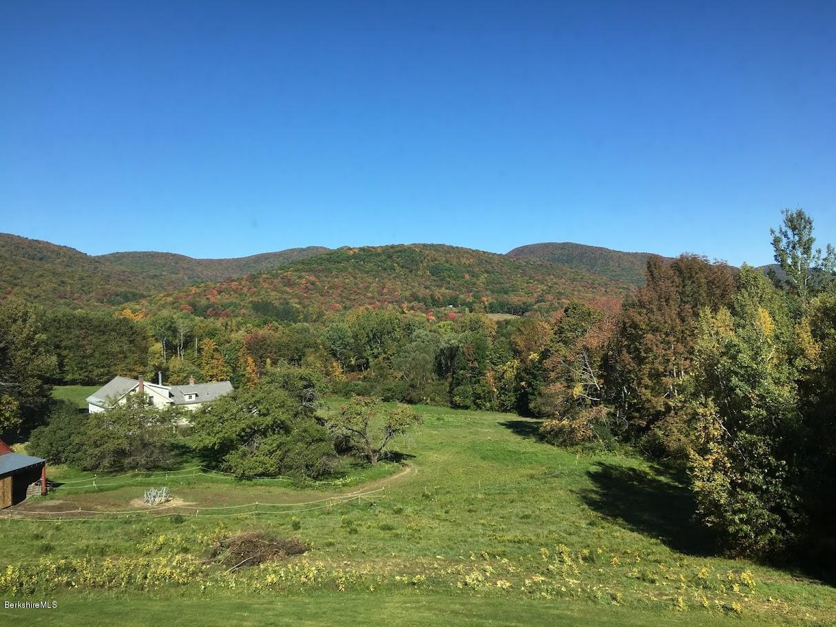 5 Jericho Road Hancock, MA 01267 - Photo 34 of 38 a view of a lush green field with a mountain in the background
