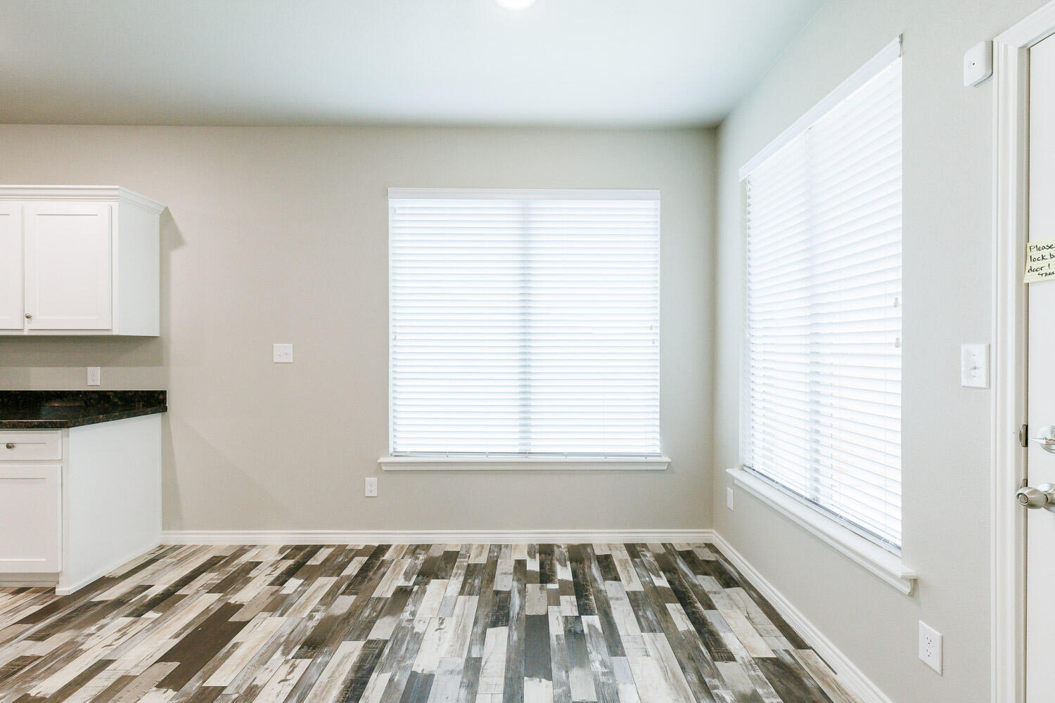 6956 12th Street Lubbock, TX 79416 - Photo 15 of 43 a view of an empty room with a window