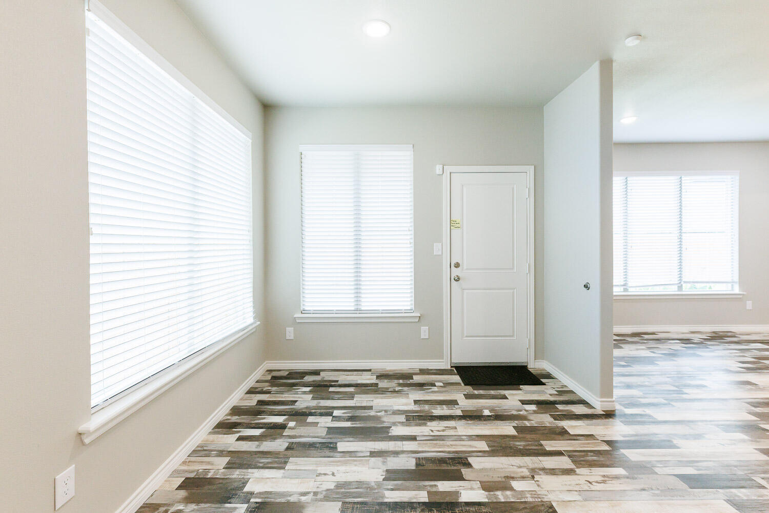 6956 12th Street Lubbock, TX 79416 - Photo 16 of 43 a view of a room that has a window in it