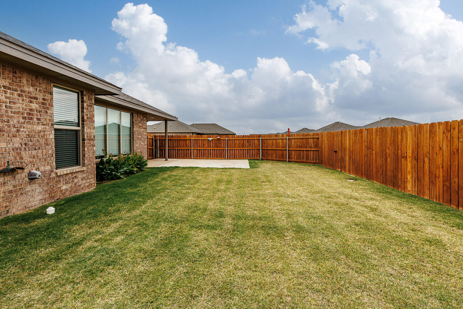 6956 12th Street Lubbock, TX 79416 - Photo 40 of 43 a view of a backyard