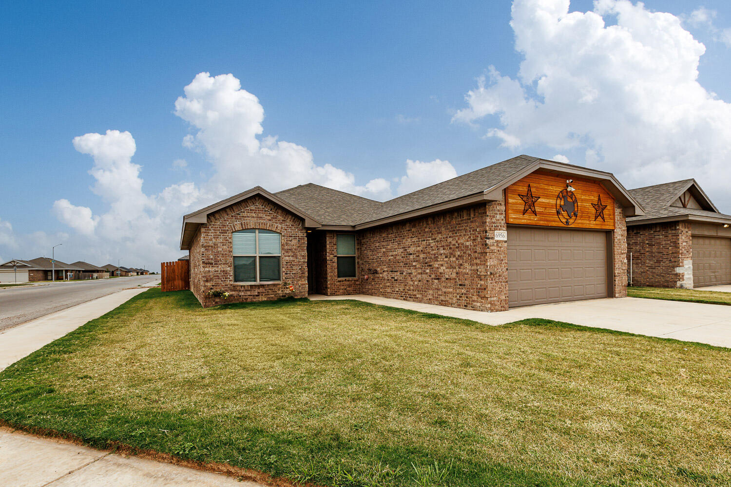 6956 12th Street Lubbock, TX 79416 - Photo 43 of 43 a view of a house with a yard