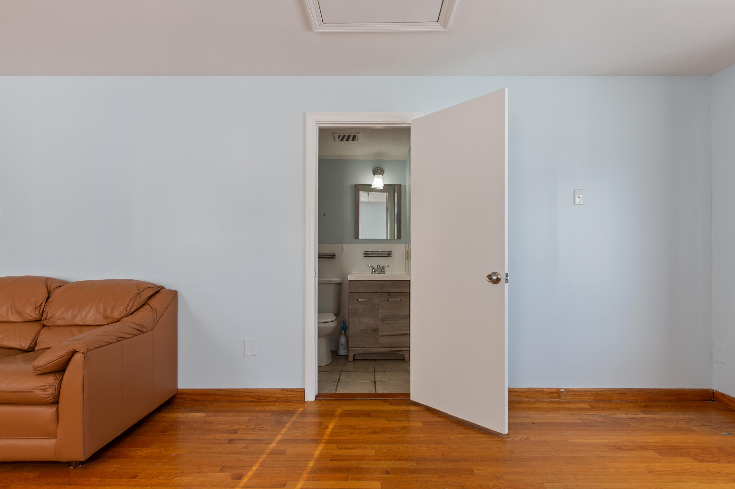 183 Captain Chase Road Dennis Port, MA 02639 - Photo 15 of 44 a view of room with furniture and wooden floor