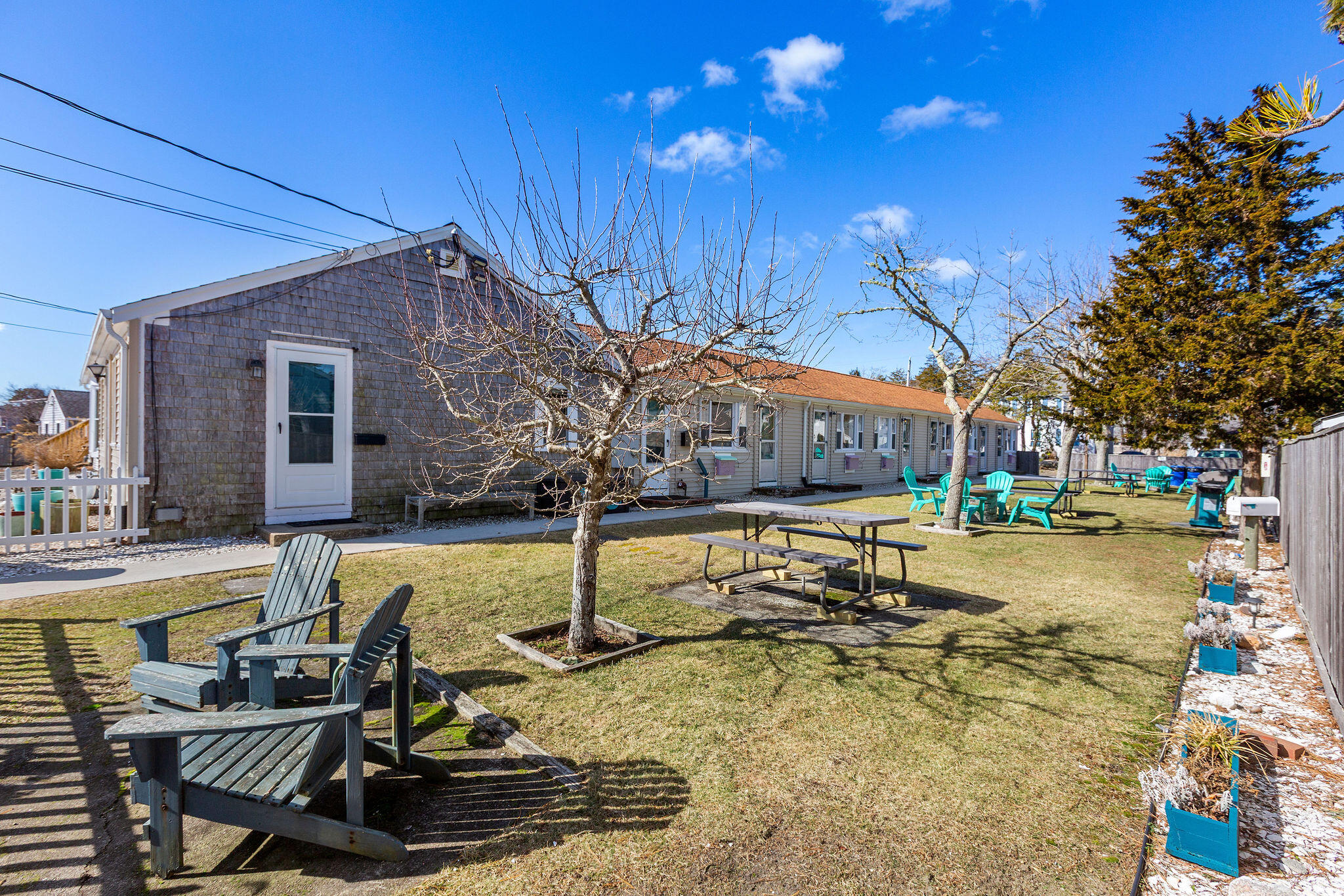 183 Captain Chase Road Dennis Port, MA 02639 - Photo 17 of 44 a view of a house with swimming pool and sitting area