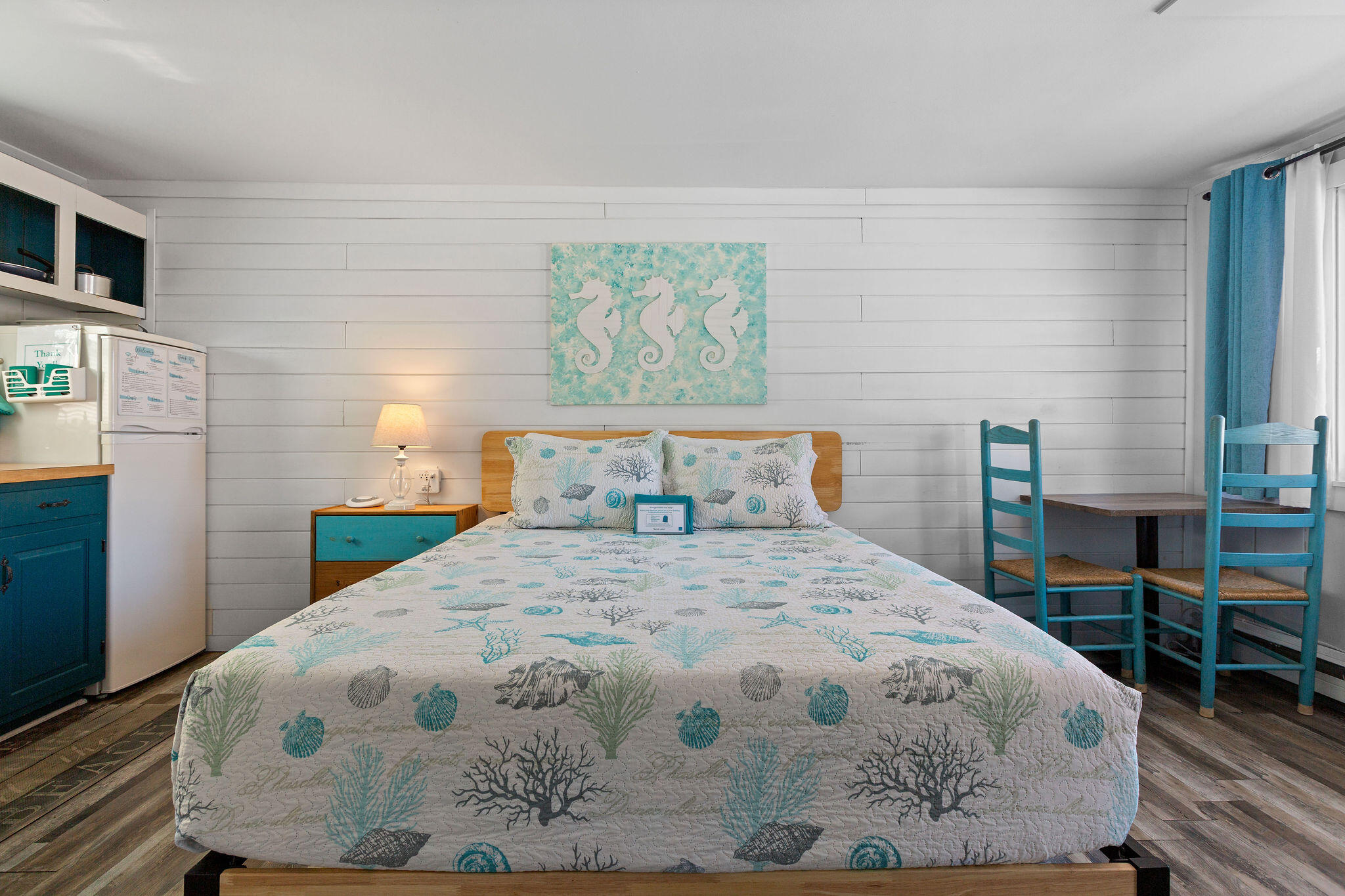 183 Captain Chase Road Dennis Port, MA 02639 - Photo 21 of 44 a bedroom with a bed and a night stand