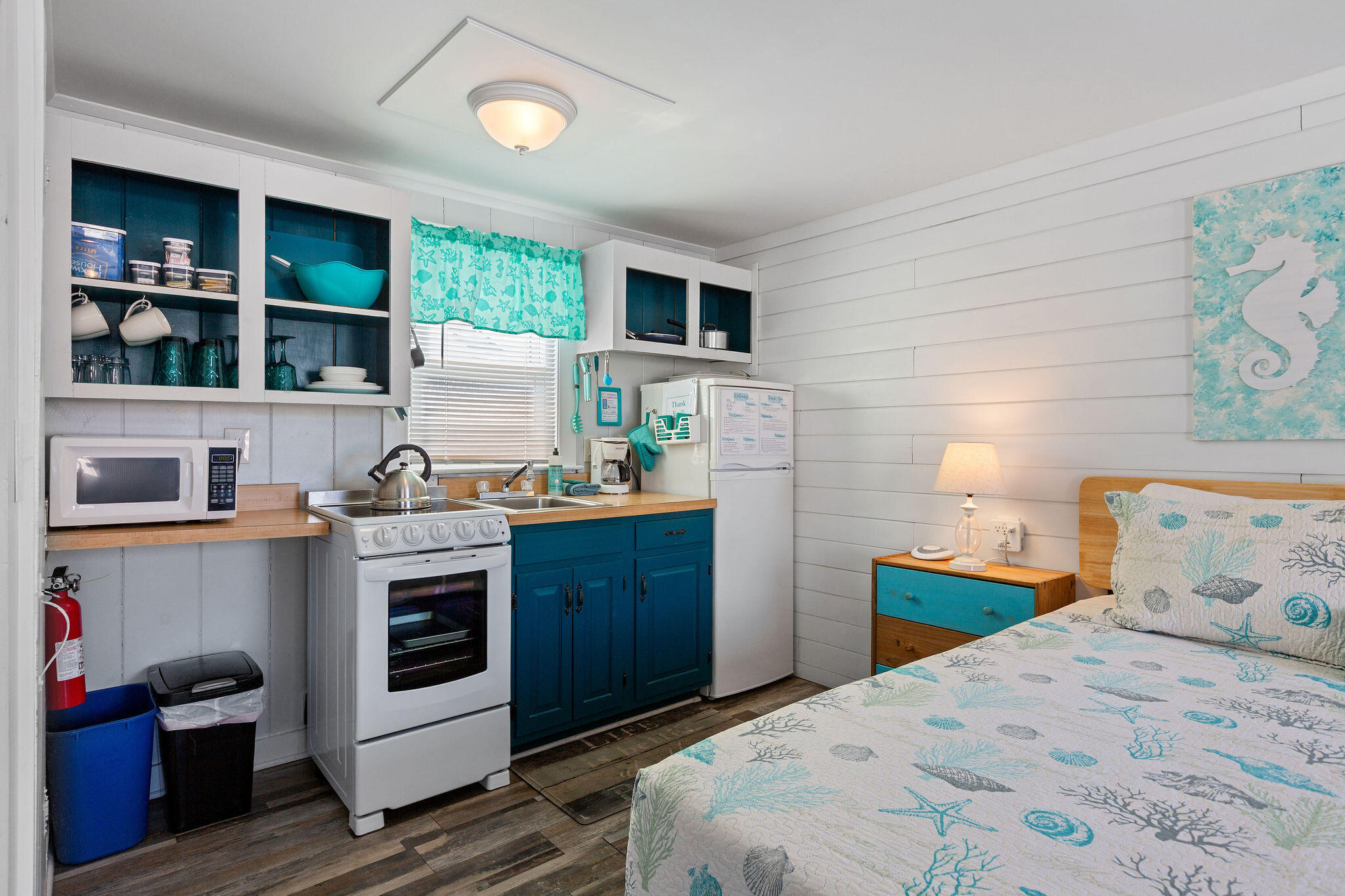 183 Captain Chase Road Dennis Port, MA 02639 - Photo 22 of 44 a kitchen with stainless steel appliances granite countertop a stove and a sink
