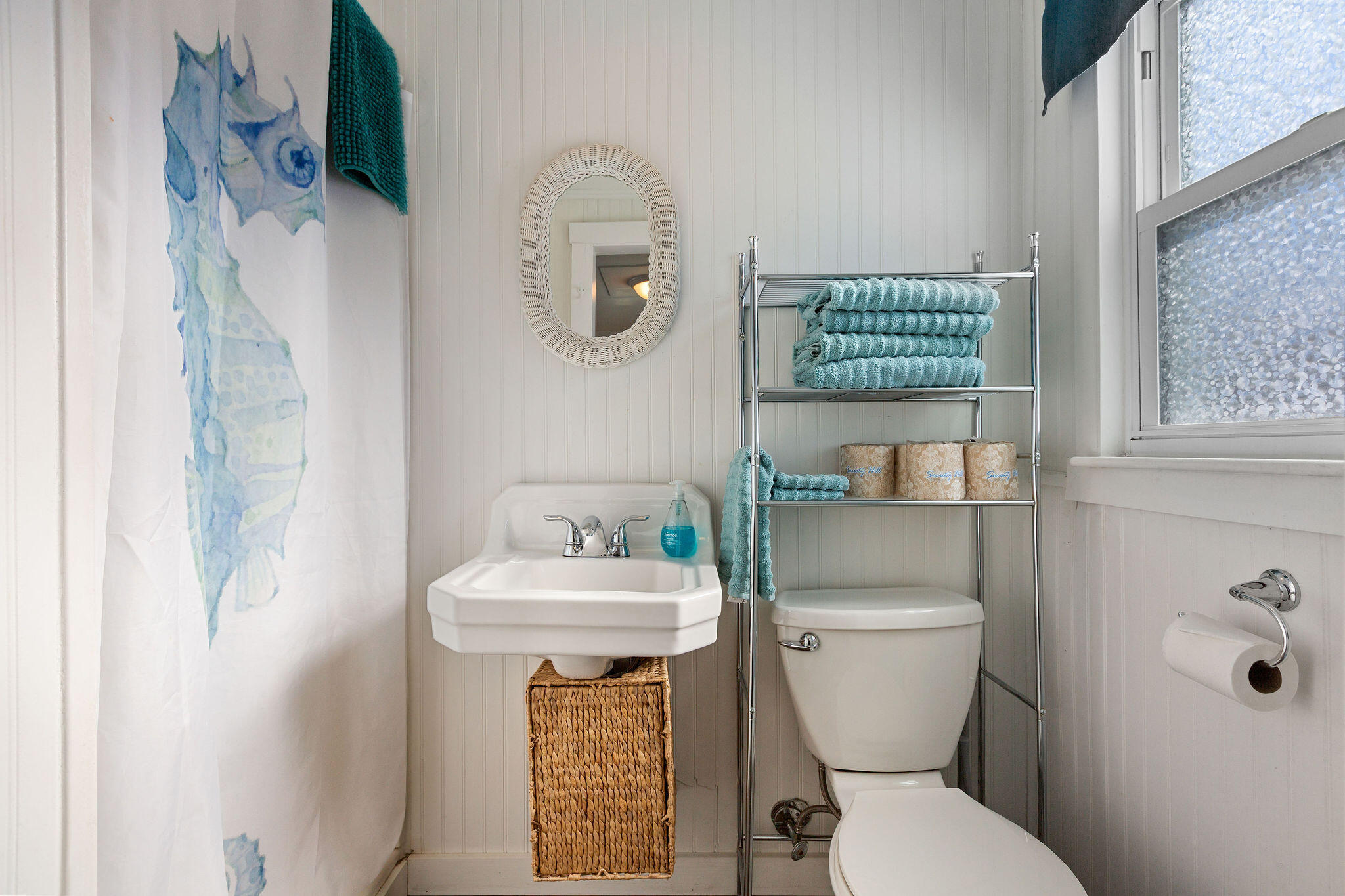 183 Captain Chase Road Dennis Port, MA 02639 - Photo 25 of 44 a white toilet sitting next to a bathroom sink