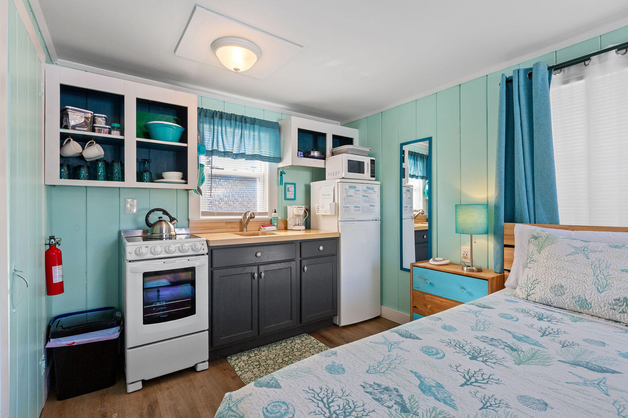 183 Captain Chase Road Dennis Port, MA 02639 - Photo 31 of 44 a kitchen with stainless steel appliances granite countertop a refrigerator and a sink