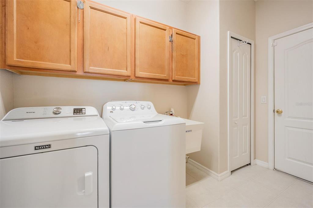 1630 Lakestone Drive Trinity, FL 34655 - Photo 19 of 49 a utility room with dryer and washer
