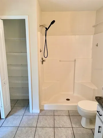 a view of a garden with an outdoor seating