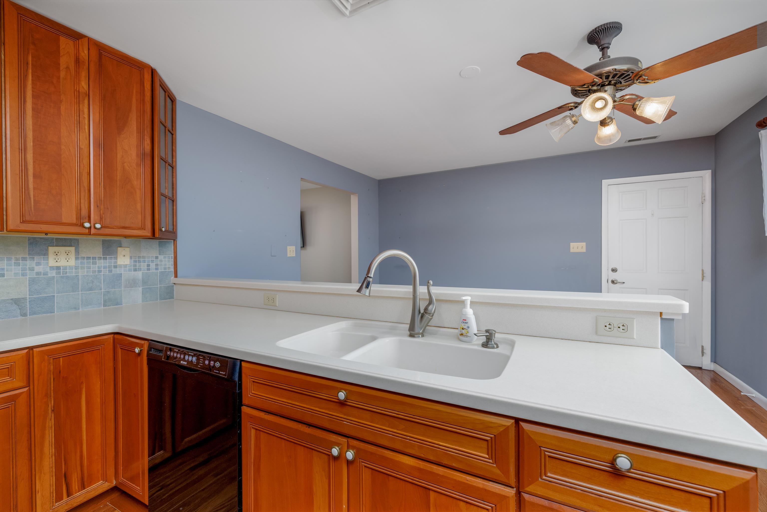 880 Honeysuckle Road Erma, NJ 08204 - Photo 13 of 31 a kitchen with a sink and cabinets