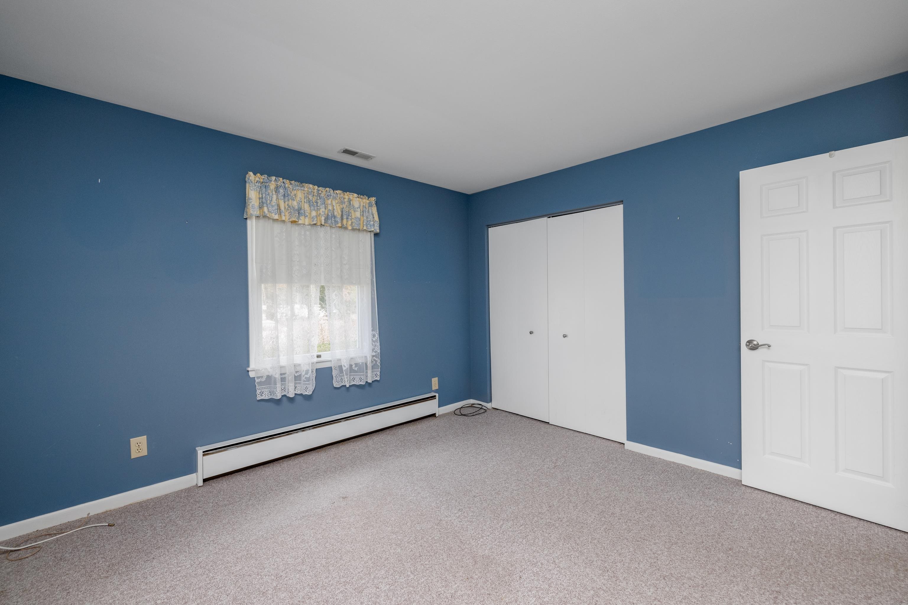 880 Honeysuckle Road Erma, NJ 08204 - Photo 19 of 31 an empty room with a empty space and windows