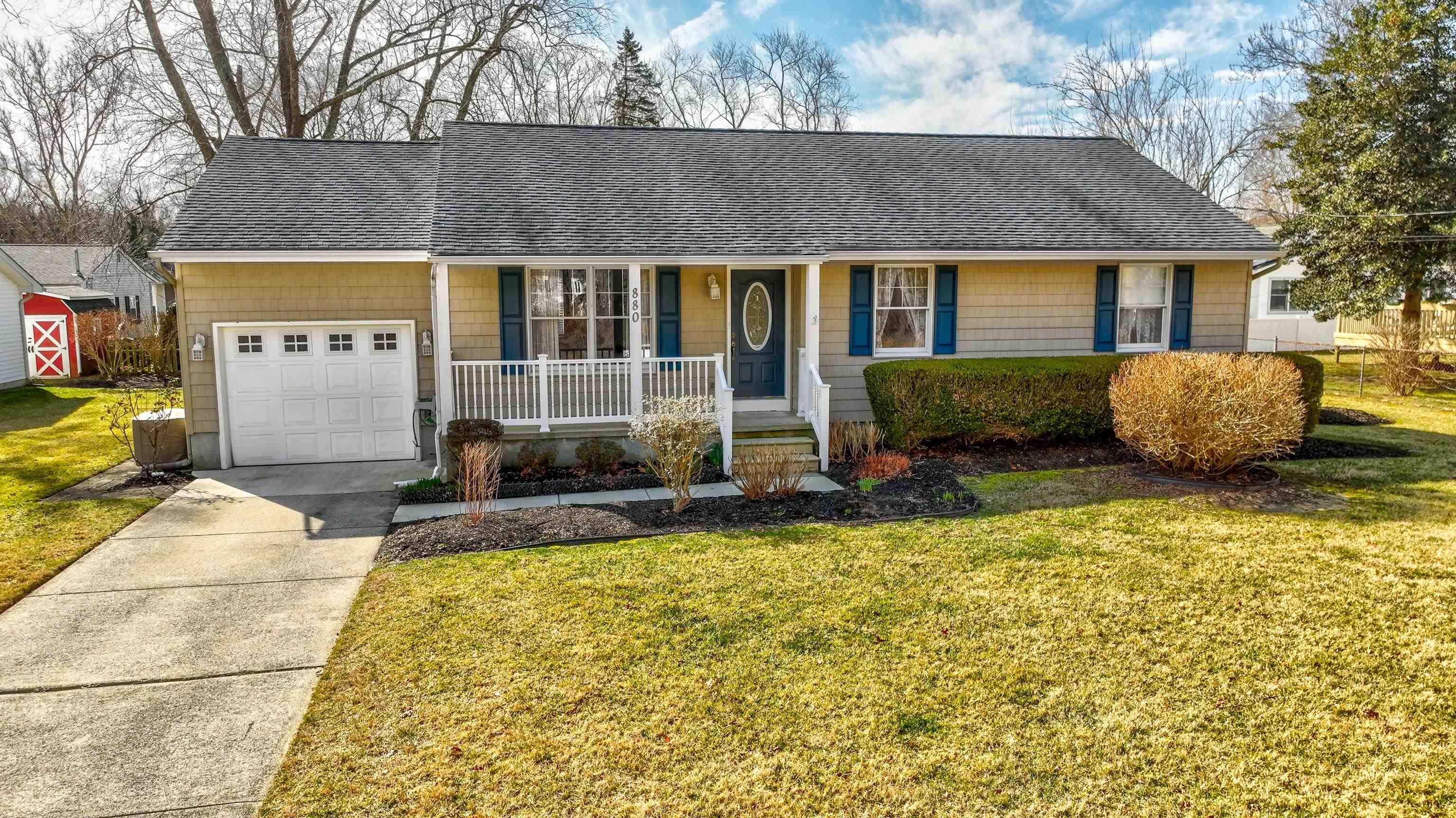 880 Honeysuckle Road Erma, NJ 08204 - Photo 27 of 31 a front view of a house with a garden