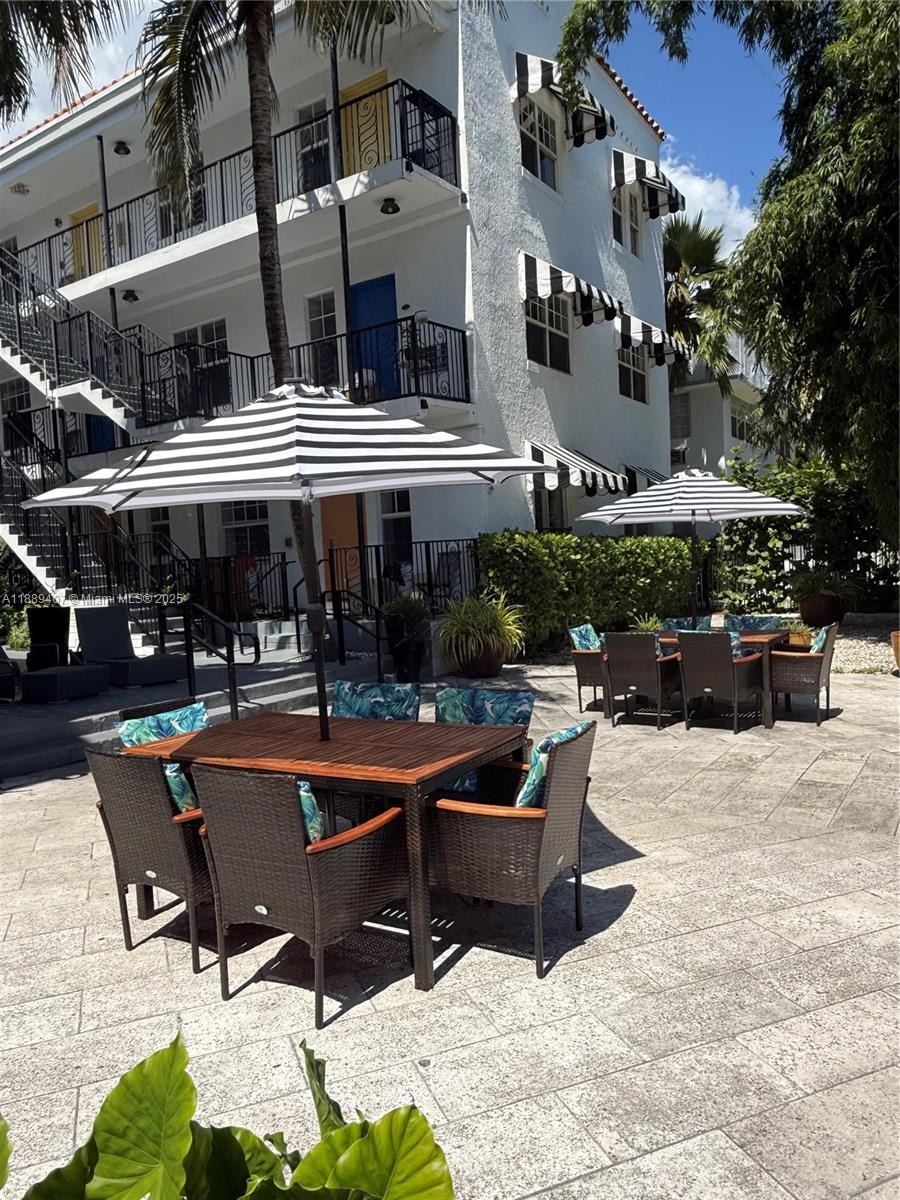 1330 Pennsylvania Avenue, Unit 313 Miami Beach, FL 33139 - Photo 3 of 14 a view of a building with sitting area