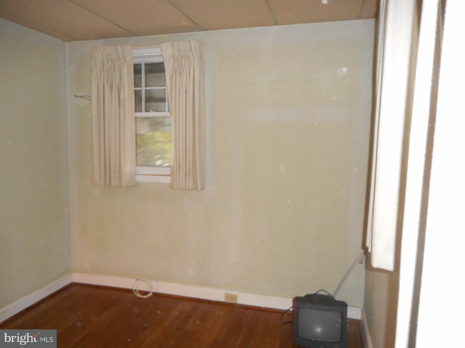 6501 Windsor Mill Road Baltimore, MD 21207 - Photo 16 of 17 an empty room with windows