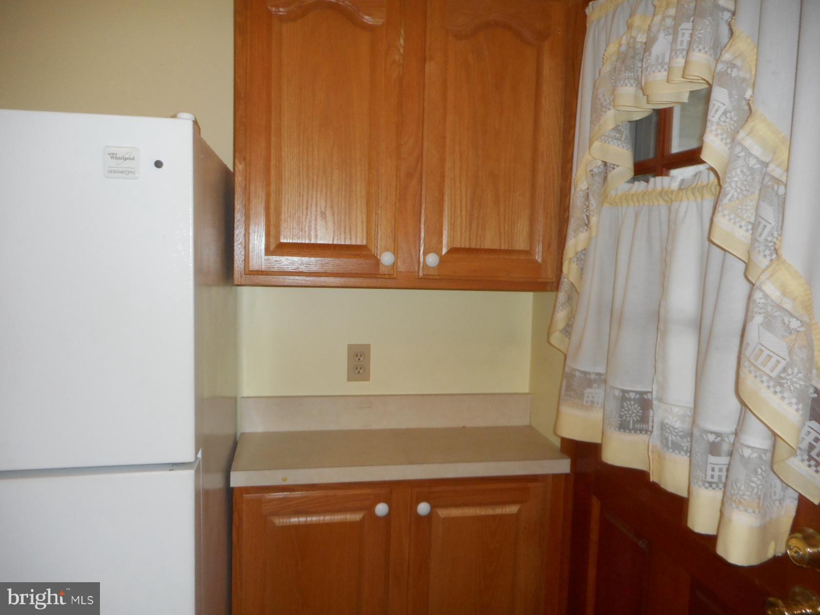 6501 Windsor Mill Road Baltimore, MD 21207 - Photo 8 of 17 a view of a utility room with washer and dryer