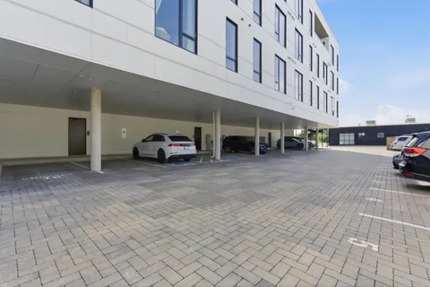 a car parked in front of a building