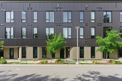 front view of a building with a street
