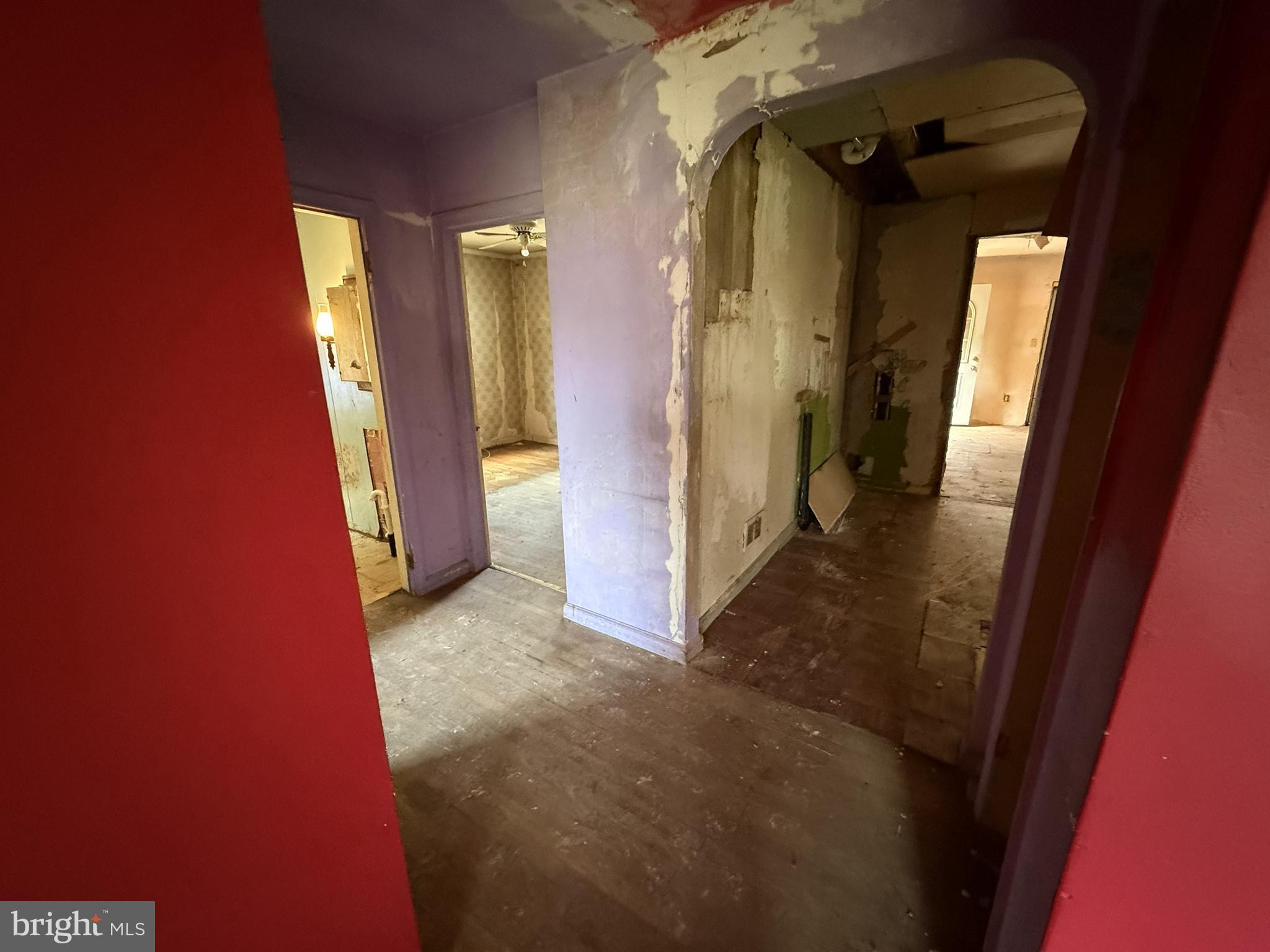 155 Silver Lake Road Bridgeton, NJ 08302 - Photo 25 of 36 a view of a hallway with wooden shelves