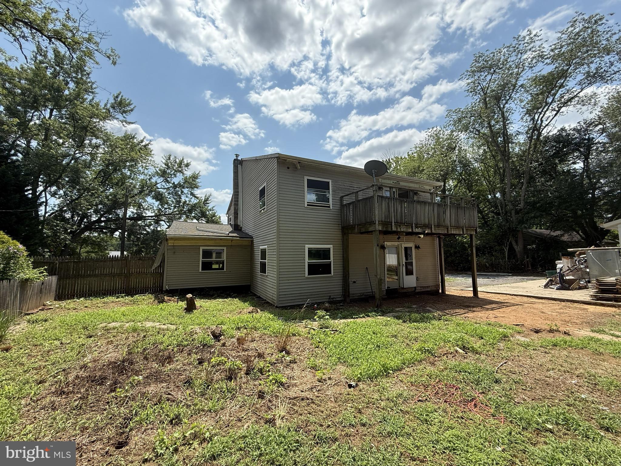 155 Silver Lake Road Bridgeton, NJ 08302 - Photo 5 of 36 a view of a house with a yard and a large tree
