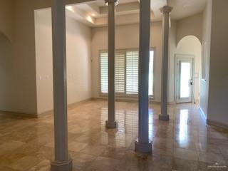 604 Avenida Morelos Rancho Viejo, TX 78575 - Photo 5 of 14 a view of a hallway with wooden floor