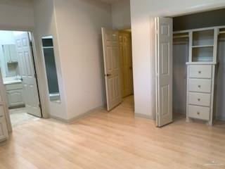 604 Avenida Morelos Rancho Viejo, TX 78575 - Photo 7 of 14 an empty room with windows and closet