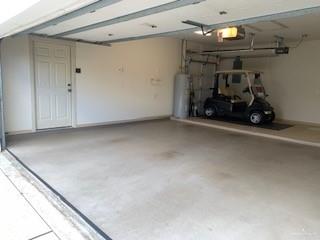 604 Avenida Morelos Rancho Viejo, TX 78575 - Photo 10 of 14 a view of a garage with parked cars