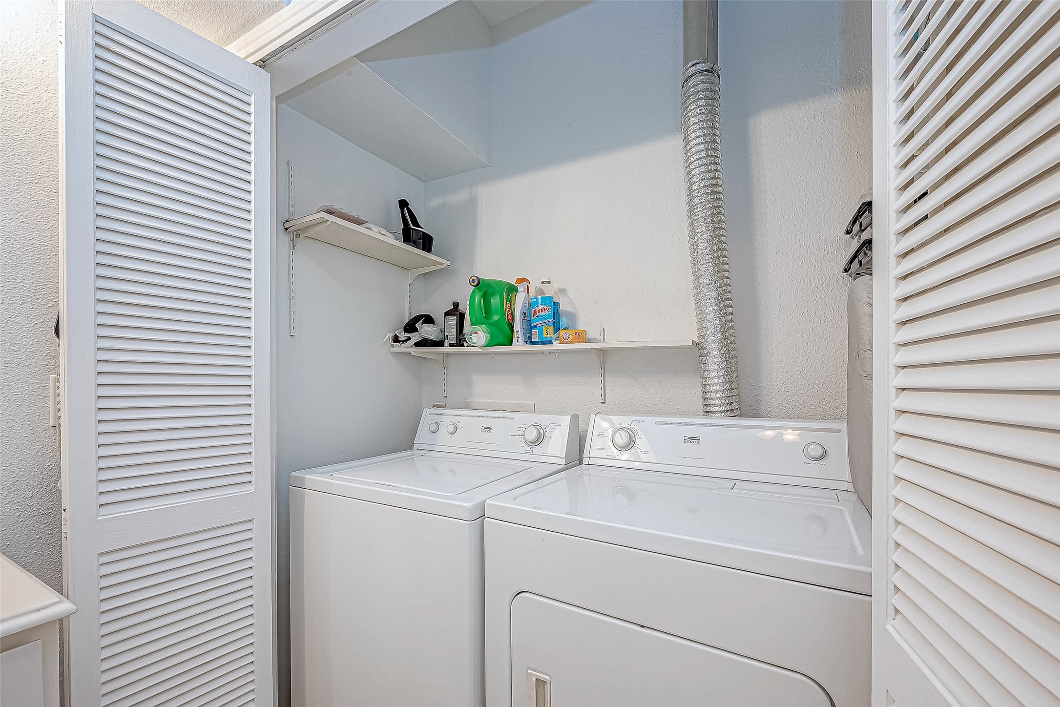 2100 Tanglewilde Street, Unit 189 Houston, TX 77063 - Photo 25 of 31 Upstairs laundry with Washer and Dryer