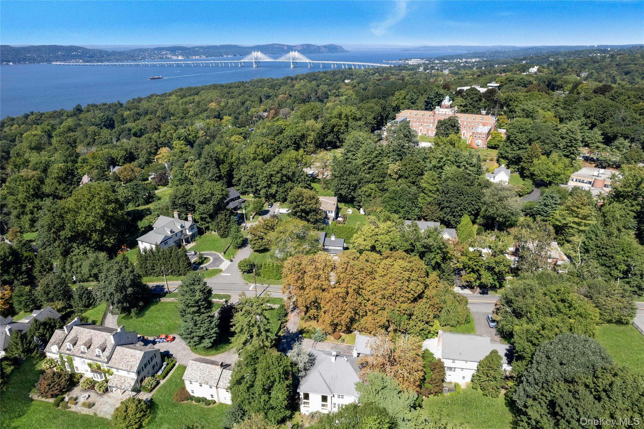 25 Riverview Road Irvington, NY 10533 - Photo 3 of 41 Lush, tree-lined neighborhood, view of the Hudson River and bridge.