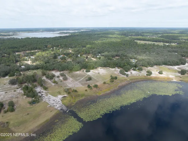 a view of a lake with a city