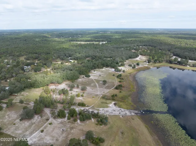 a view of a lake with beach