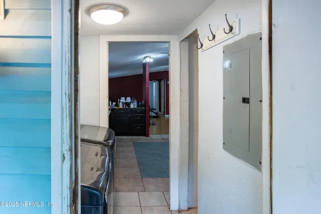 a en suite bathroom with a sink and mirror