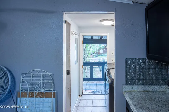 a view of entryway with wooden floor