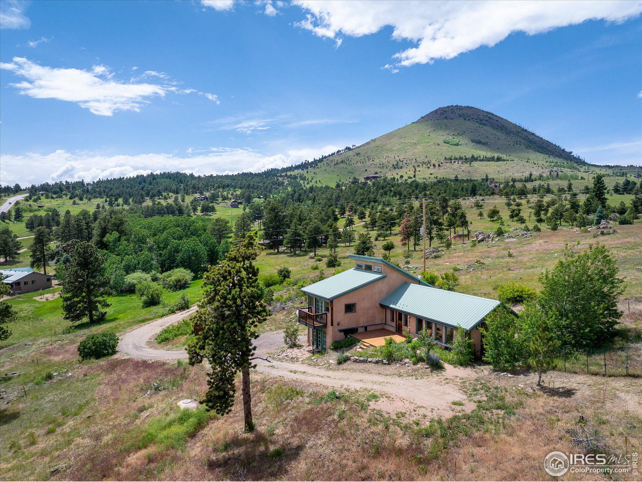 78 Old Post Office Road Boulder, CO 80302 - Photo 1 of 25 a view of a house with a yard