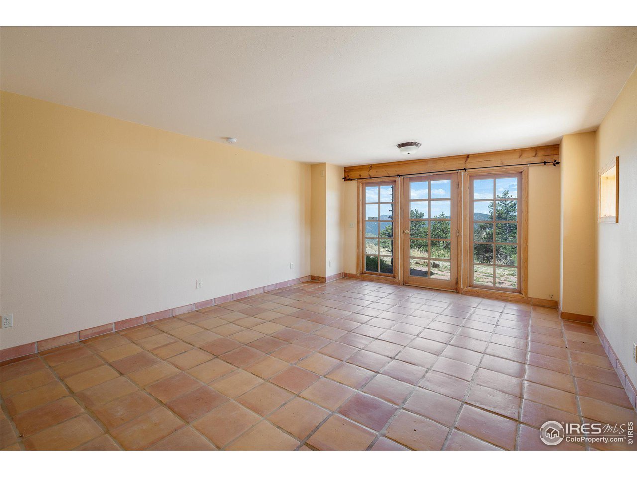78 Old Post Office Road Boulder, CO 80302 - Photo 20 of 25 a view of an empty room with a window