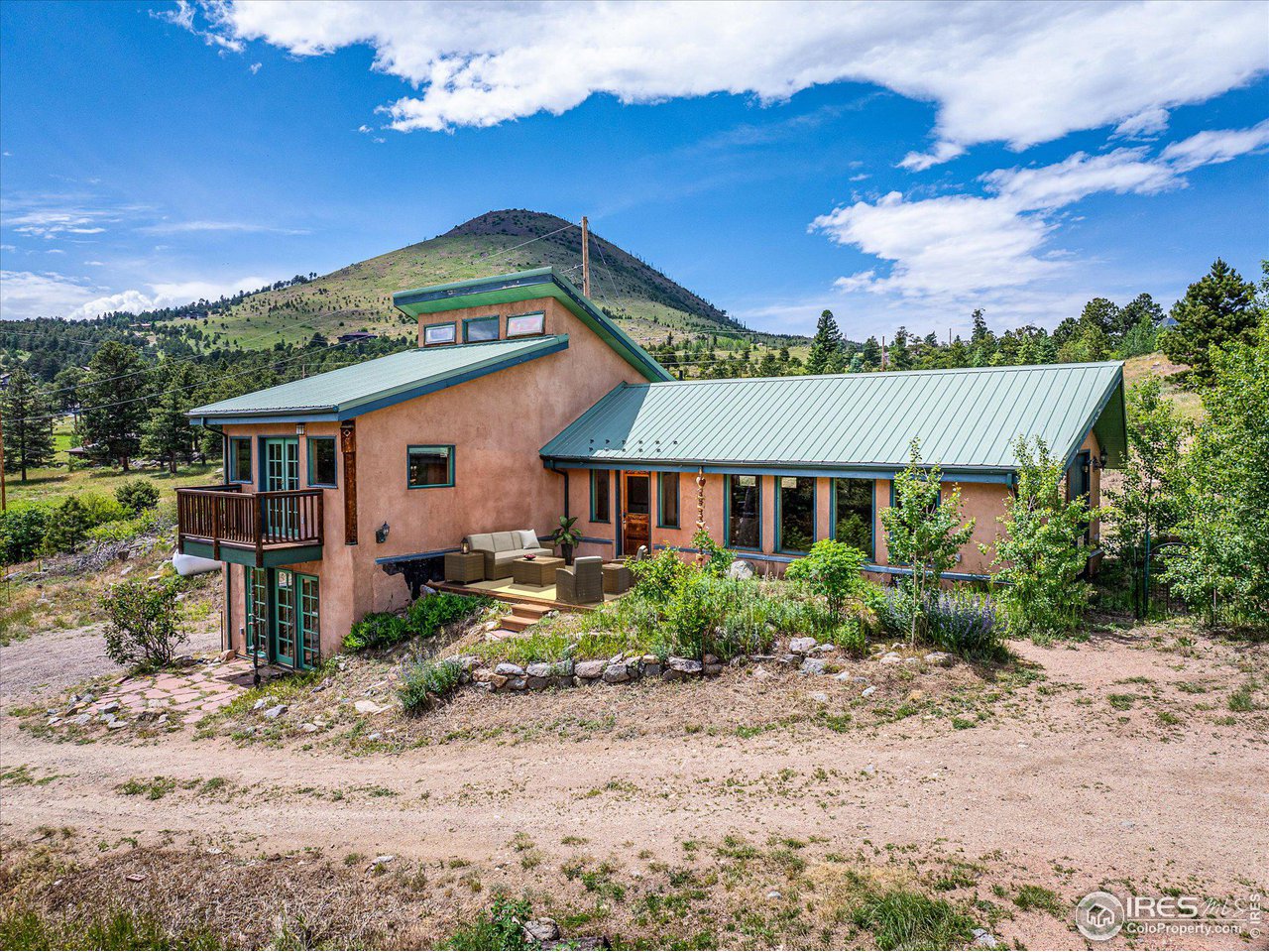 78 Old Post Office Road Boulder, CO 80302 - Photo 2 of 25 a house with trees in the background