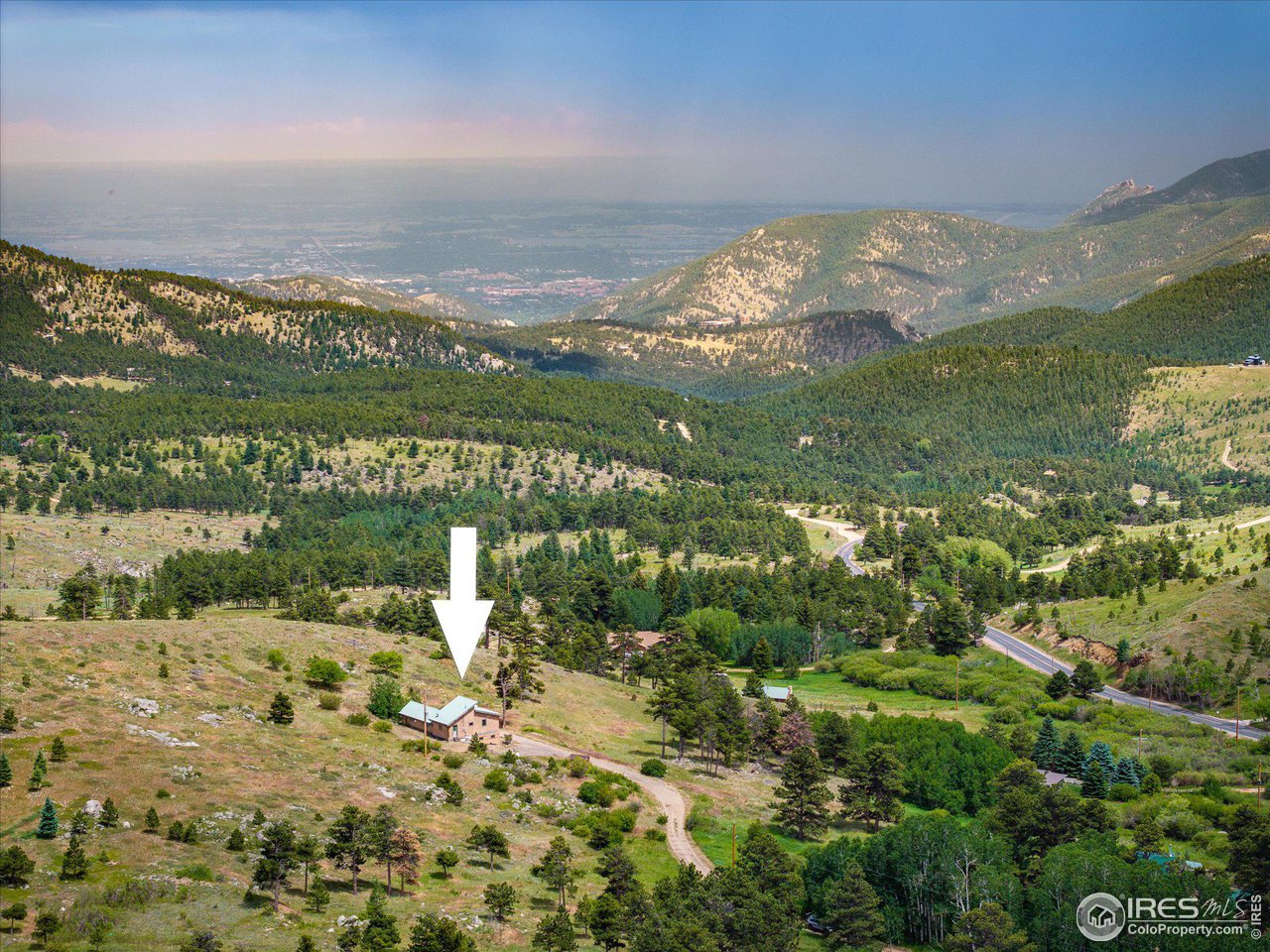 78 Old Post Office Road Boulder, CO 80302 - Photo 5 of 25 a view of a city with mountains in the background