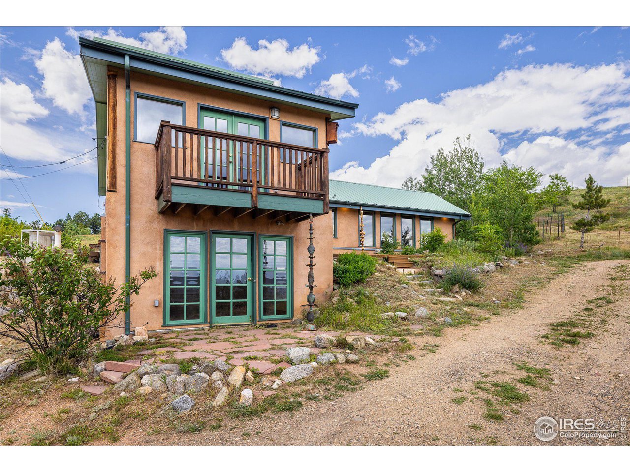 78 Old Post Office Road Boulder, CO 80302 - Photo 6 of 25 a view of a house with a yard