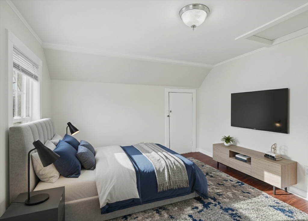 7 Mystic Street Methuen, MA 01844 - Photo 17 of 30 a bedroom with a bed and a flat screen tv