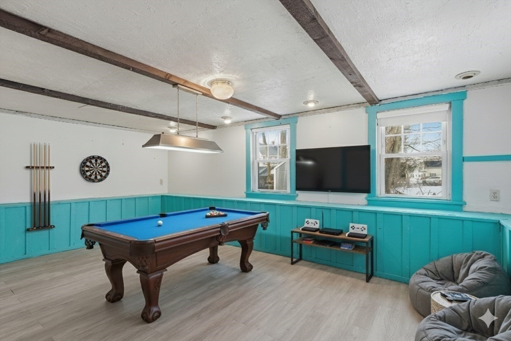 7 Mystic Street Methuen, MA 01844 - Photo 20 of 30 a room with furniture and a flat screen tv