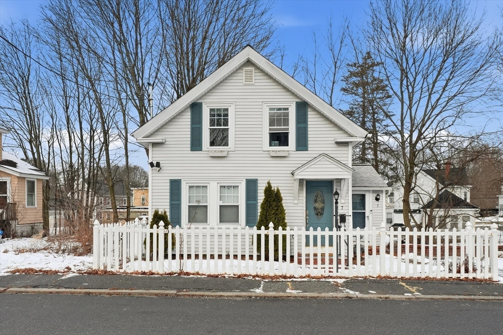 7 Mystic Street Methuen, MA 01844 - Photo 30 of 30 a view of a white house with iron fence