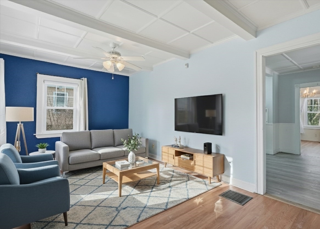 7 Mystic Street Methuen, MA 01844 - Photo 4 of 30 a living room with furniture and a flat screen tv