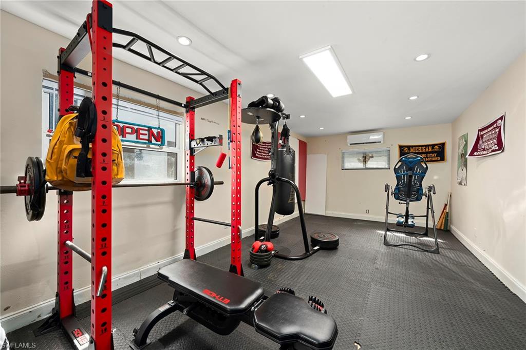 2605 64th Street Southwest Naples, FL 34105 - Photo 39 of 45 a view of a room with gym equipment