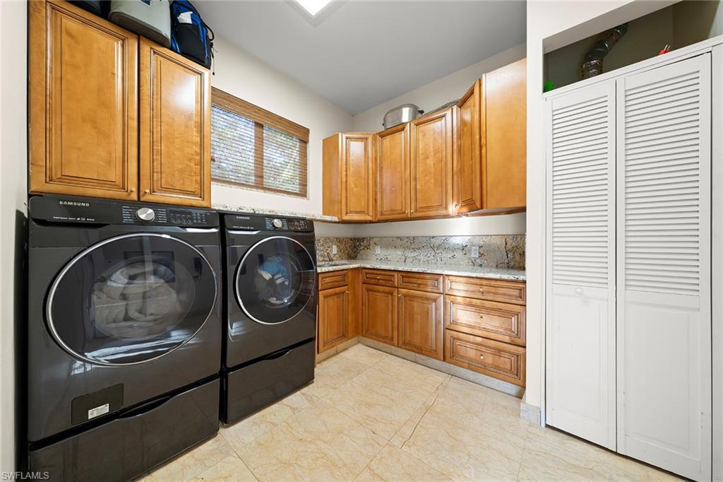 2605 64th Street Southwest Naples, FL 34105 - Photo 40 of 45 a utility room with sink dryer and washer
