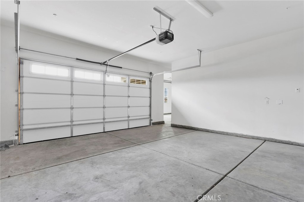 12925 Davona Dale Road Apple Valley, CA 92308 - Photo 42 of 44 a view of a garage