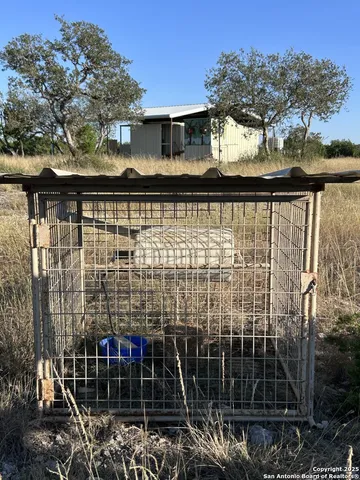 a view of entryway with a tree
