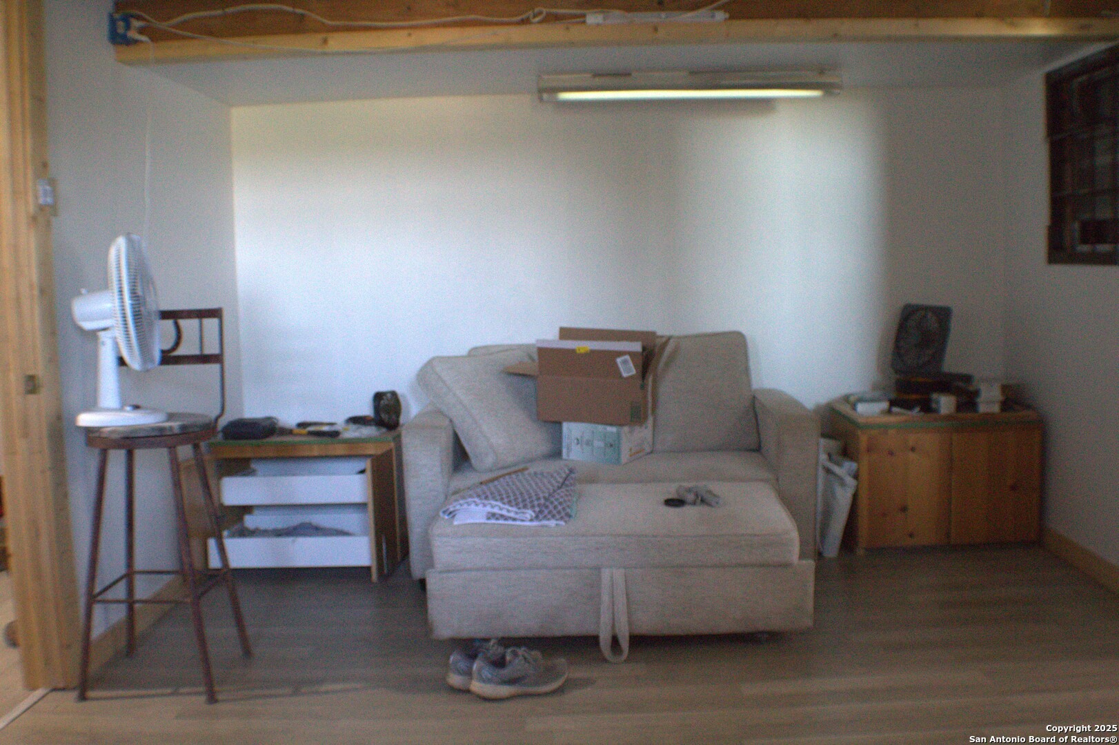 840 SD 23040 Rocksprings, TX 78880 - Photo 45 of 56 a utility room with furniture and a wooden floor