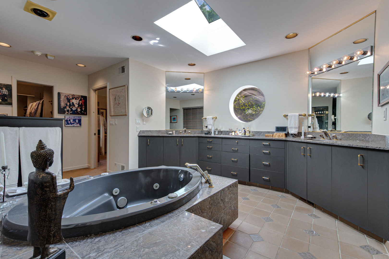 1144 Mayfair Lane Glencoe, IL 60022 - Photo 17 of 23 a living room with granite countertop furniture a mirror and a clock