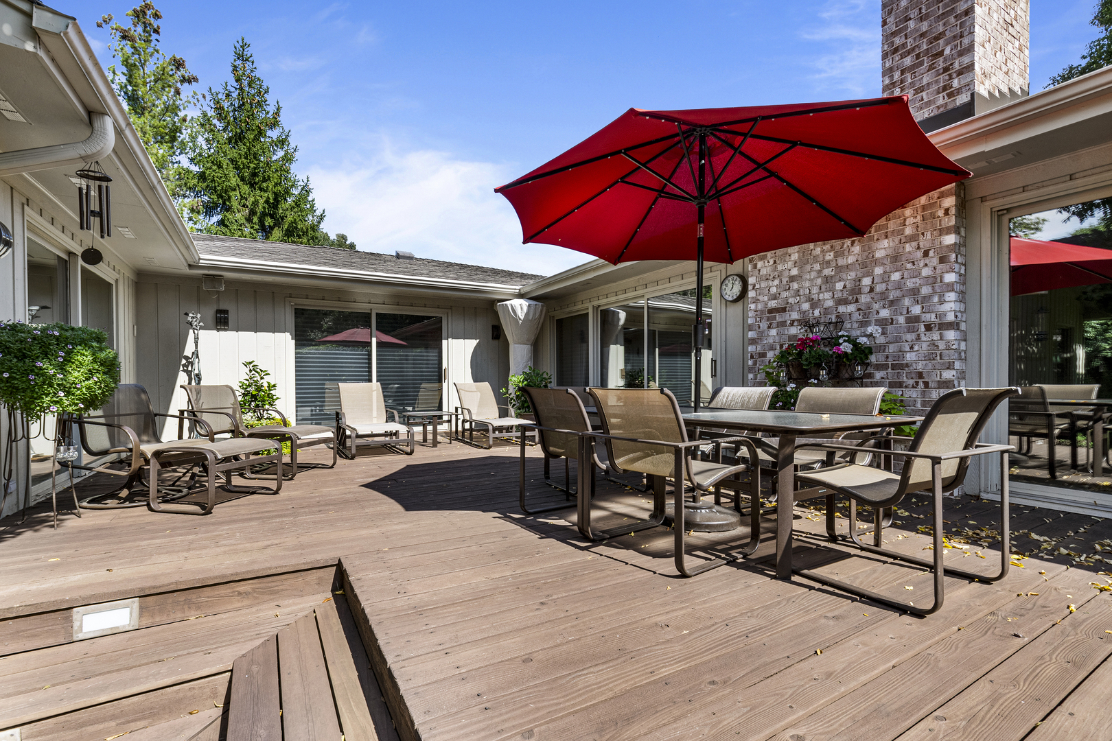 1144 Mayfair Lane Glencoe, IL 60022 - Photo 20 of 23 a view of a dinning table and chairs in patio of the house