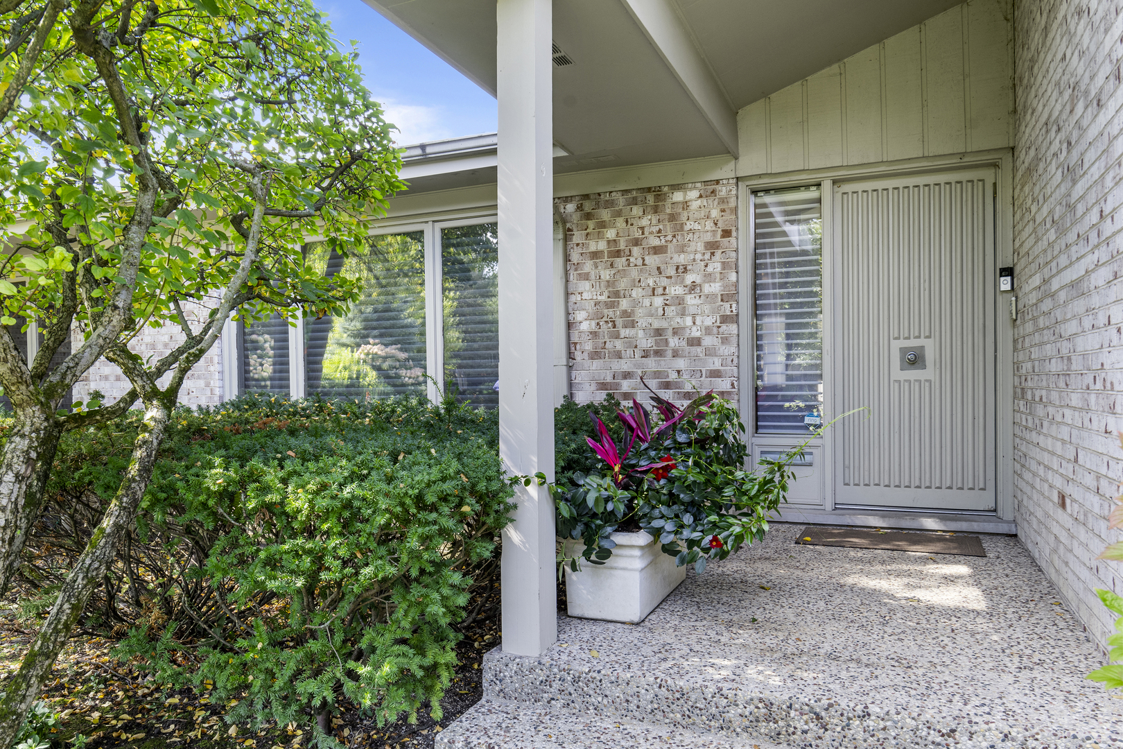 1144 Mayfair Lane Glencoe, IL 60022 - Photo 2 of 23 a view of a potted plants in front of a door